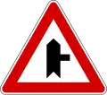 Junction with a minor side-road from right (also used )
