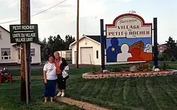 Petit-Rocher welcome sign, 2002