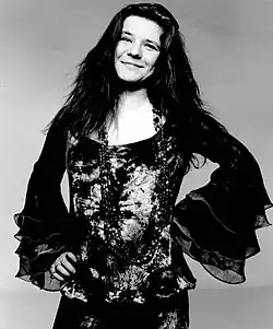 Joplin facing a camera and smiling