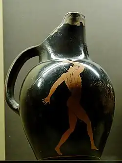 Oinochoe Shape 7, H. 21&nbsp;cm (8+1⁄4&nbsp;in), diam. 12.8&nbsp;cm (5.0&nbsp;in), Javelin thrower. Attic red-figured, c. 450 BC.