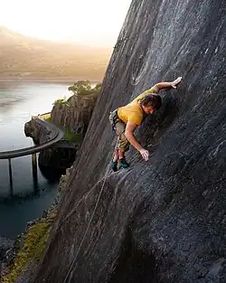 British climber Johnny Dawes on a slab climb in Wales