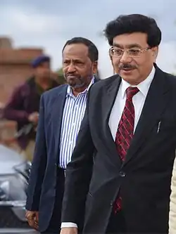 Justice Rahim and Mr U Nisar Ahmed walking