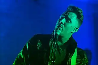 DeWitt performing with Wild Cub at Lambert's BBQ in 2014