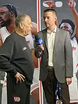 Kevin Sampson being interviewed by CBS Sports' Matt Norlander prior to Houston's 2025 Final Four game against Duke at the Alamodome