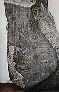 Fragment of a stele of dark greenish quartzite on which Khasekhem, last king of the 2nd dynasty, appears "smiting the foreign lands"