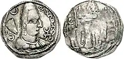 Khingila with the word "Alchono" in Bactrian script (αλχονο) and the Tamgha symbol on his coins.[6][7]