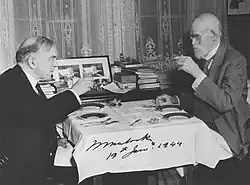 Prime Minister Mackenzie King and Sir William Mulock at breakfast on Mulock's 101st birthday
