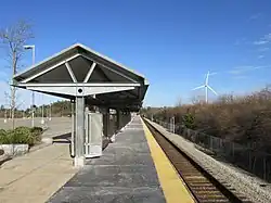 A railway station with a high-level platform and one track