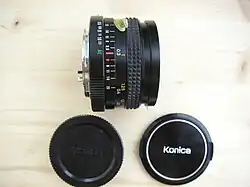 28&nbsp;mm f/3.5 with caps (style 3, c. 1974–1982)