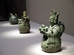 Wine ewer in the shape of a seated immortal (National Treasure No. 167)