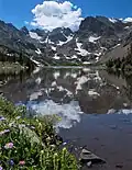 Navajo Peak, Apache Peak, and Shoshoni Peak reflected in Lake Isabelle