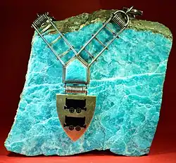Amazonite from the Landsverk 1 mine with the livery collar of the mayor of Evje, Norway. Size: 21&nbsp;cm ×&nbsp;22&nbsp;cm (8.3&nbsp;in ×&nbsp;8.7&nbsp;in).