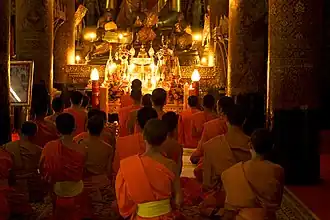 Image 5Monks gathered at evening prayer (from Culture of Laos)