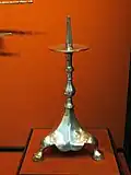Detail of the silver lamp-stand or candelabra