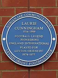 Blue plaque outside Brisbane Road