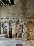 Collection of statues at the Abbey of Graville