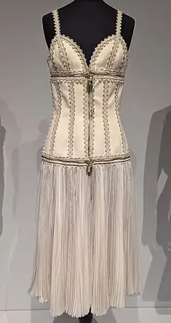 Sleeveless cream dress on mannequin