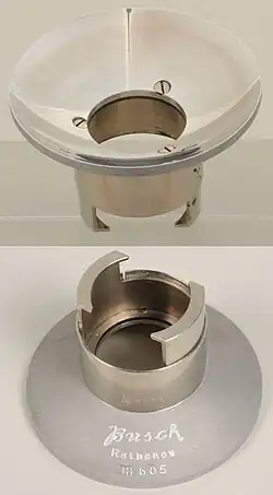 Two images, one showing the device from the mirrored side and another from the other side.
