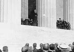 President Harding gives a speech in front of the Lincoln Memorial.