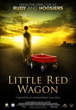 A young boy tows a little red wagon under a sky with bright light at the bottom and dark clouds as the top. Text at the bottom of the poster reveals the title, production credits and rating.