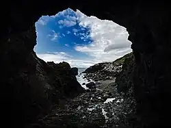 Low tide inside Tobin's Tunnel, a man-made stone tunnel near Mussel Rock.