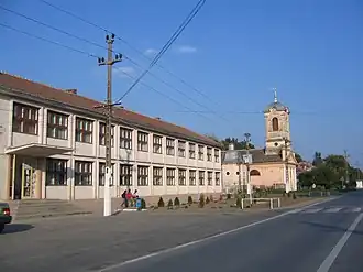 The high school and the Roman Catholic church in Lovrin
