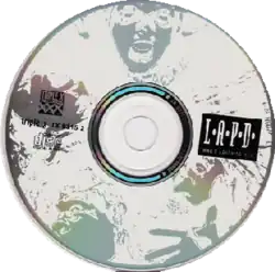 A Compact disc with "L.A.P.D." written on it, and is a silver/white CD.