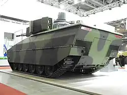 Rear three-quarter view of the Lynx KF31 prototype as shown at IDET 2017 in the Czech Republic.