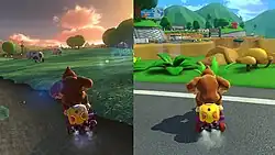 A series of screenshots demonstrates the graphical differences between courses from the base game and the DLC. The left screenshot shows Donkey Kong on the Wii Moo Moo Meadows stage from the base game, set on a sunset, with textured grass and a dirt road. The right screenshot shows Donkey Kong on the DS Shroom Ridge course from the DLC, nearing a cliff on a curved road in daylight. Donkey Kong is on a flat, asphalt road with a white stripe, with grass in front of him more brightly colored than the grass on Moo Moo Meadows.