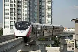 A pink line monorail train