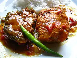 A traditional Bengali and Odia fish meal&nbsp;– Rice with Macher Jhol/Machha Jhola (Literally translated to "Fish's gravy")