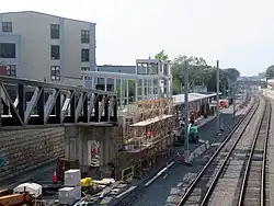 Construction of a railway station in a wide cut