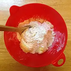 Flour is added as needed to make a workable dough.