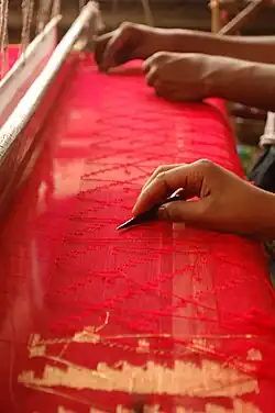 Weavers at work in Bangladesh.