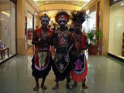 Papuan people in folk dress in Jakarta.