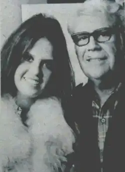 A black-and-white photograph of Marie Osmond and her father.
