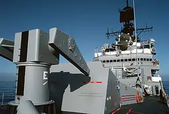 USS&nbsp;Worden showing the Mk 10 GMLS. Note the launcher at left, the blast doors behind launcher where the missiles exit the launcher feeder and AN/SPG-55 radars at middle right.