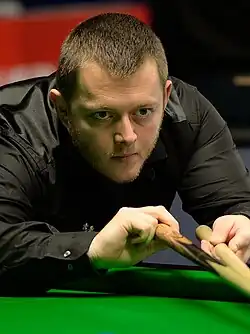 Mark Allen playing a shot