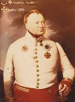 Colored print shows a portly man with light brown hair wearing a white military uniform.