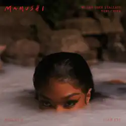 Megan Thee Stallion partially submerged in white water