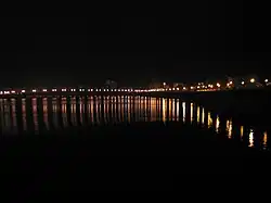 A view of the Mei River in Meizhou at night.