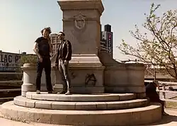 The statue-less pedestal of the police monument on the 100th anniversary of the Haymarket Affair in May 1986; the pedestal has since been removed.