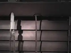 Detail of turning rod (blind stick) attachment on miniblind