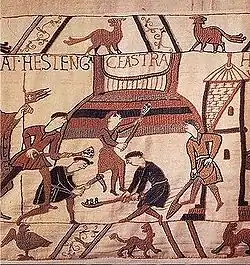 Building of a motte-and-bailey castle at Hastings in the Bayeux Tapestry.