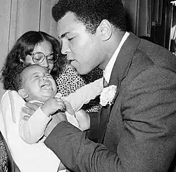 Ali with his daughter Hana as a baby in 1977