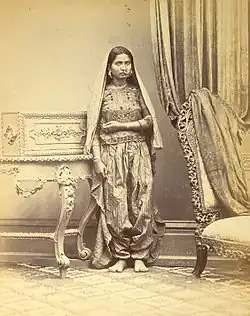 Woman, in Sind, British India, in Sindhi slim pajamo shalwar.