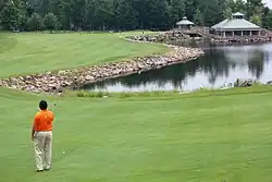 The approach to a hole with a water hazard
