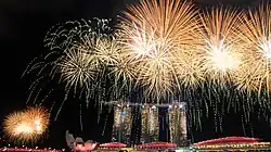 Image 8Fireworks over the Marina Bay skyline following the conclusion of the 2015 National Day Parade on 9 August 2015. (from History of Singapore)