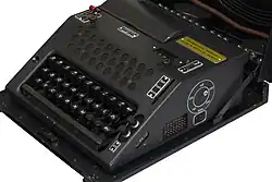 view of the right side of the machine with the port for the removable extra lamp panel