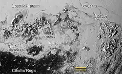 Hillary Montes and Tenzing Montes on Pluto, (context; 14 July 2015).